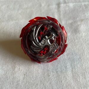 Red and Silver Toy Spinner Beyblade